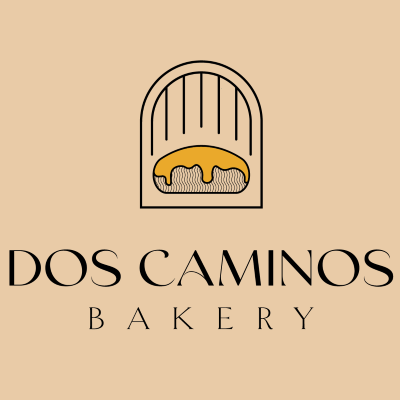 Dos Caminos Bakery logo