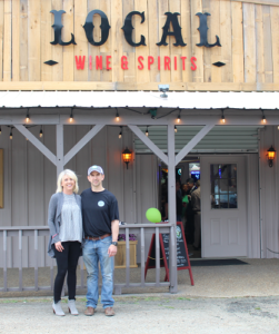 Leah Hasley and Jay Arnold, the owner of Local Wine & Spirits