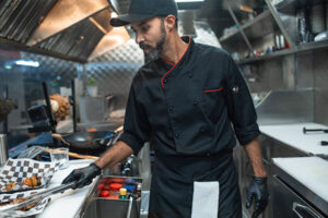 Food truck chef cooking menu items