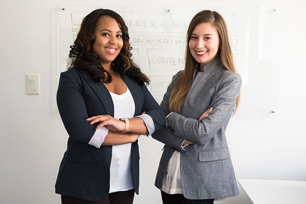 Two women business owners planning together