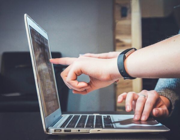 Close up laptop and hands