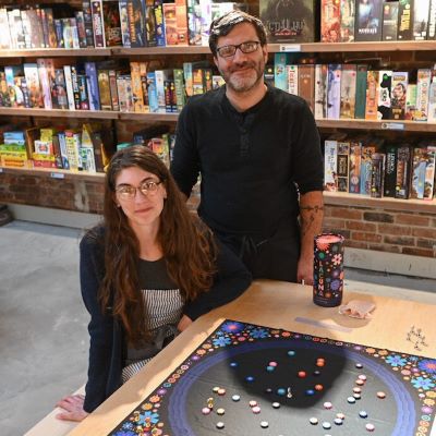 Caverns & Forests board game cafe owners