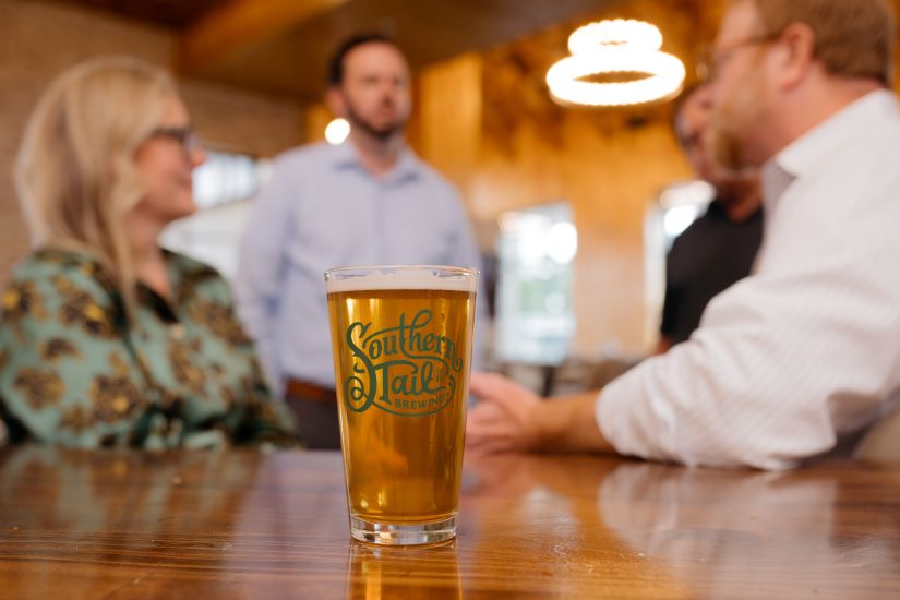 Glass of beer on the bar at Southern Tail Brewing